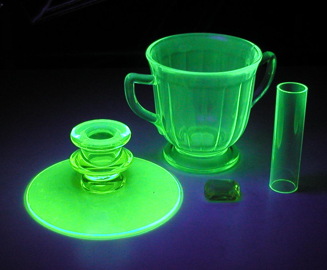 Vaseline glass dinnerware under UV light