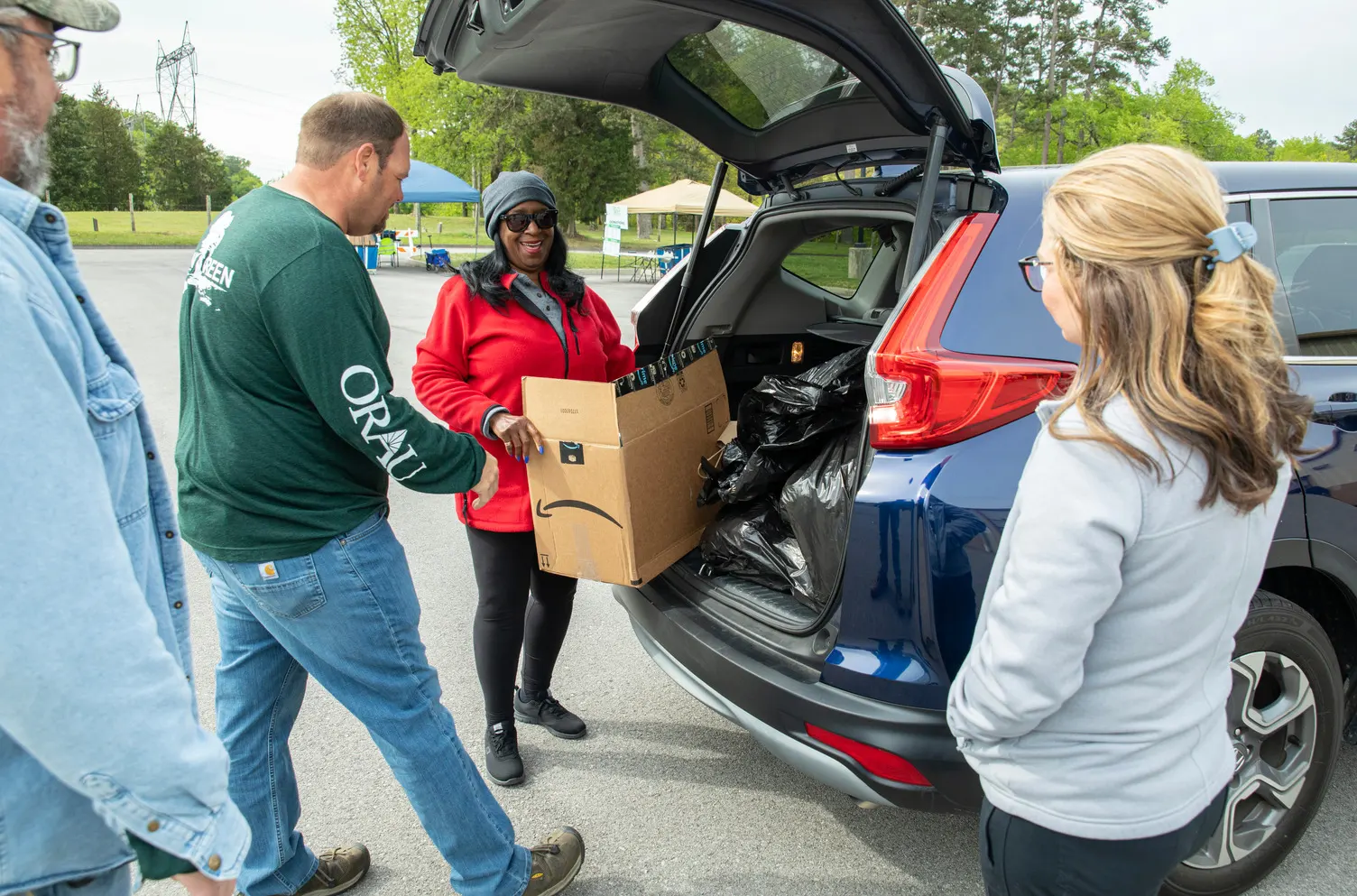 Employees participate in the annual Earth Day recycling event
