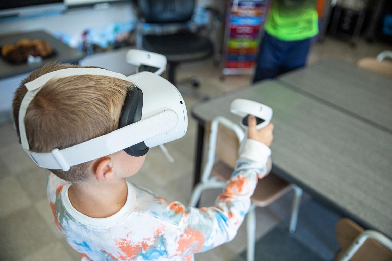 Young boy using virtual reality headset