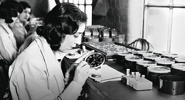 Radium dial workers painting clock faces with radioluminescent paint