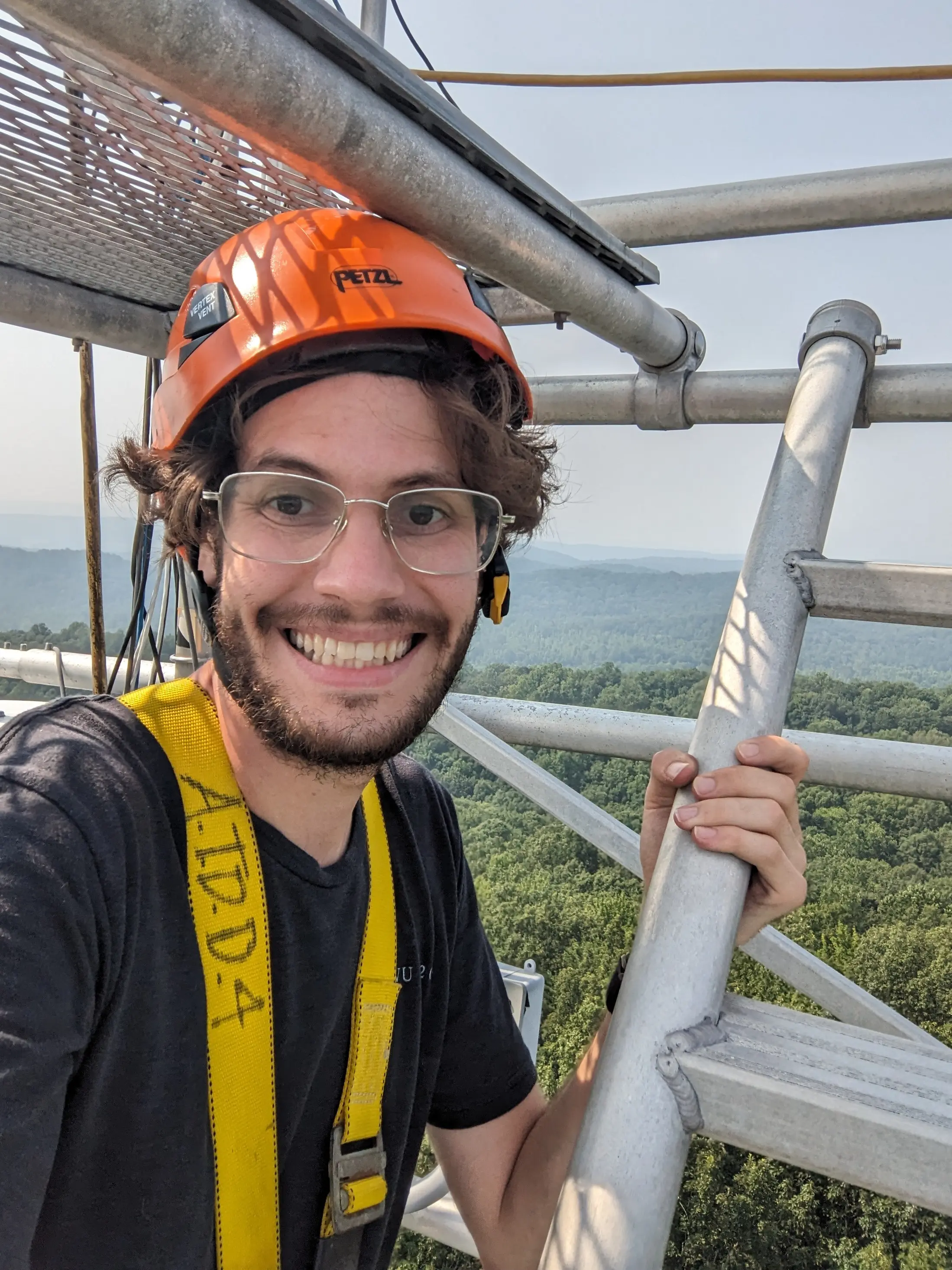 ATDD engineer Dominick Christensen works on one of ATDD’s weather station towers.