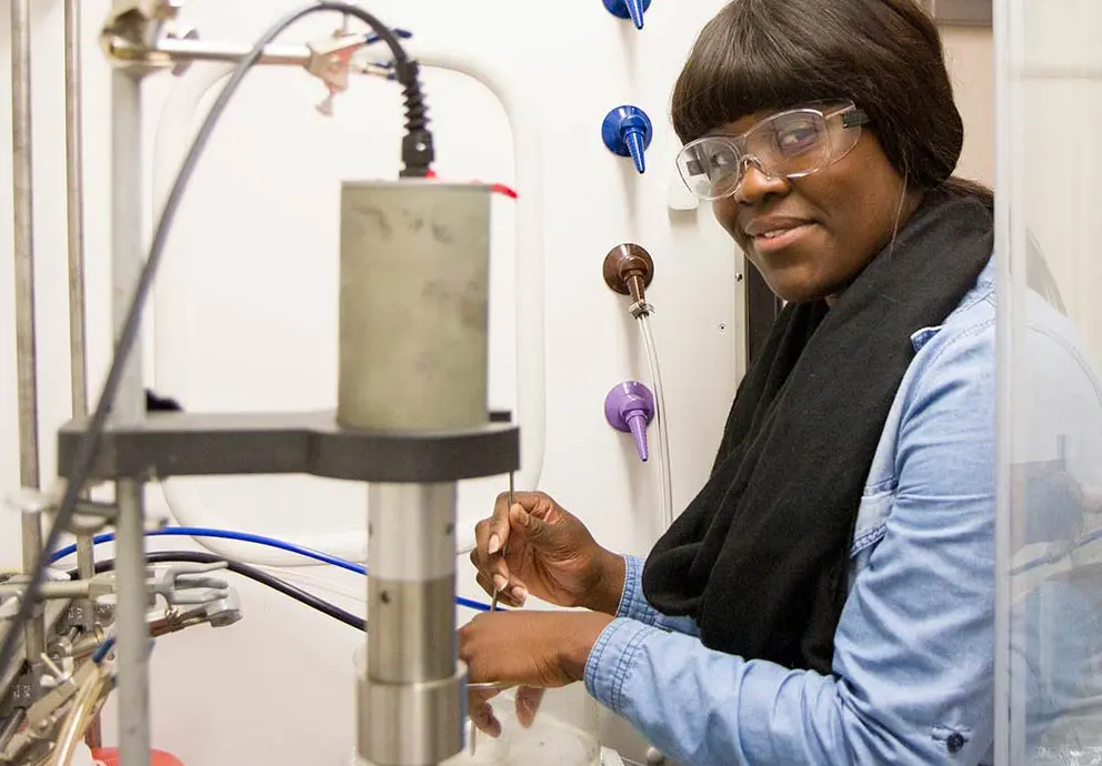 Female researcher works in a laboratory