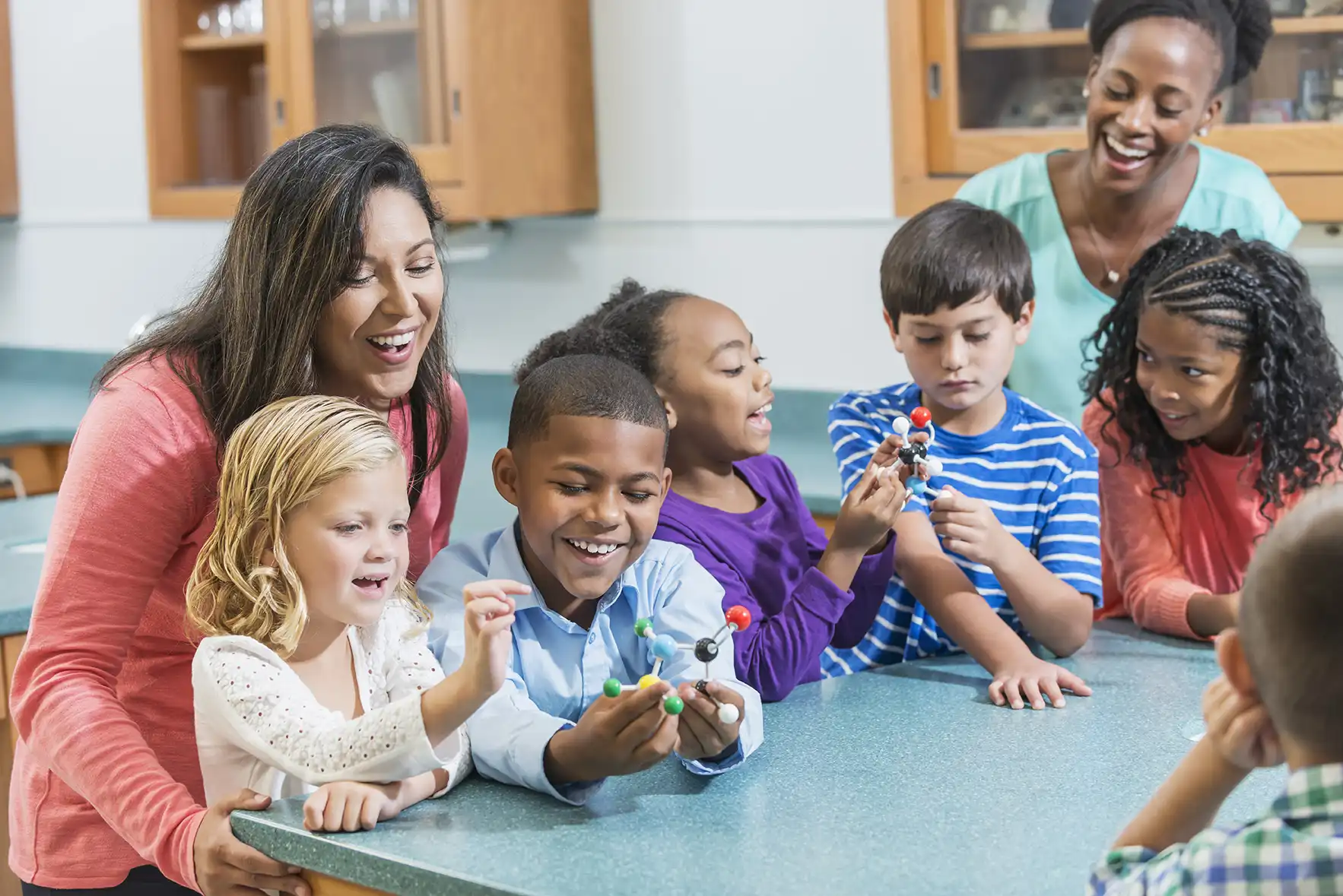 elementary students playing with an educational building toy