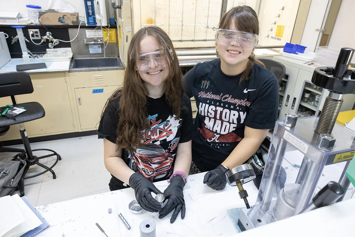 Students conduct lab research during a STEM workshop