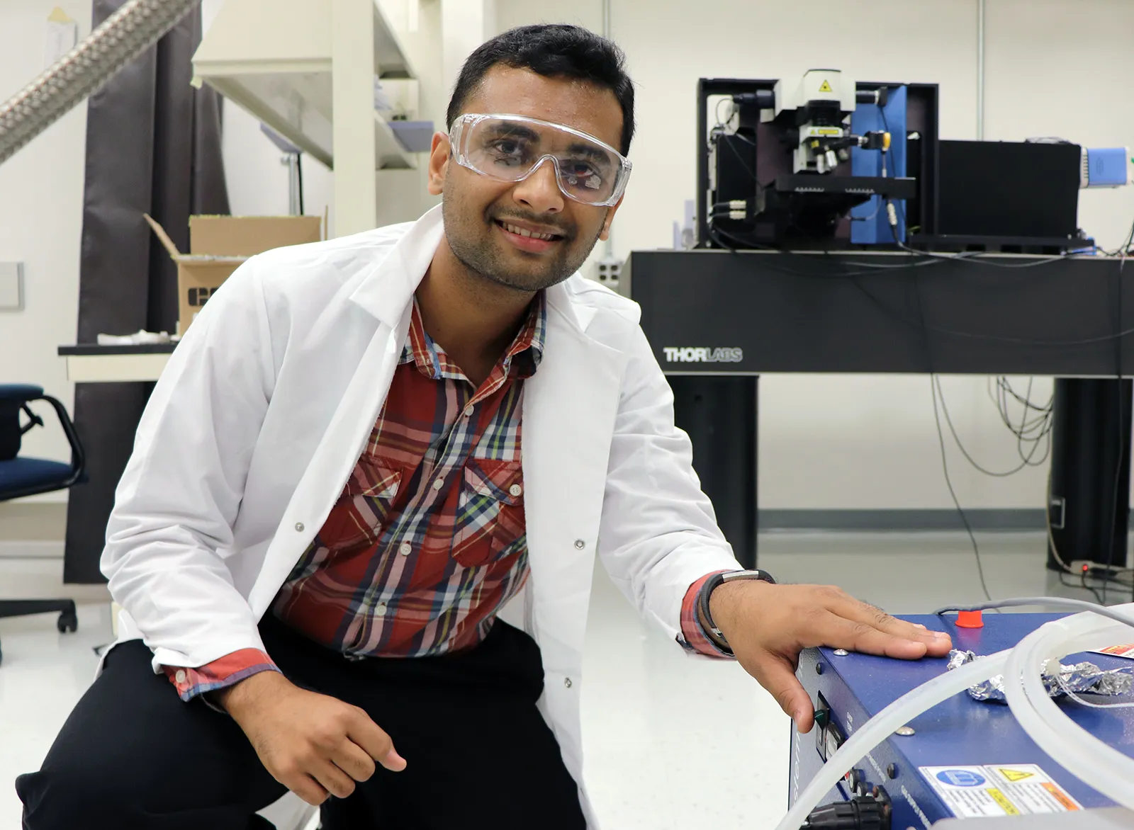 A researcher conducts laboratory research