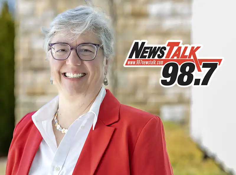 Laura Hammons with the Newstalk Radio logo